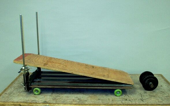 Dumbbell down skateboard ramp