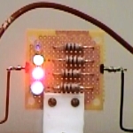 Board with blue LED barely lit