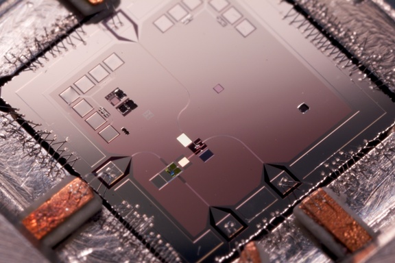 Mechanical resonator coupled to a Qubit