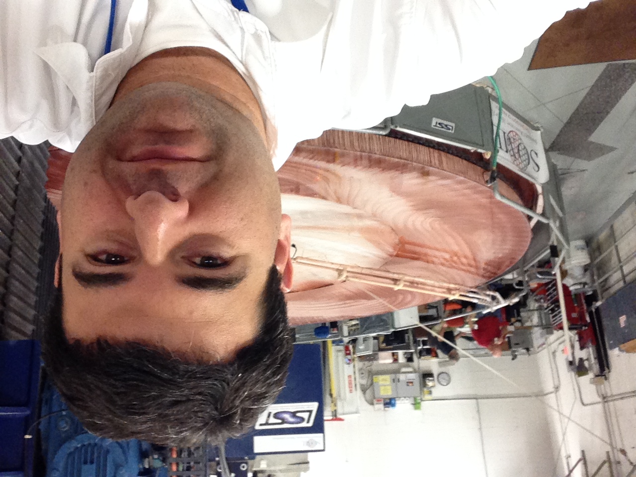 Professor Ben Mazin with the LSST primary mirror